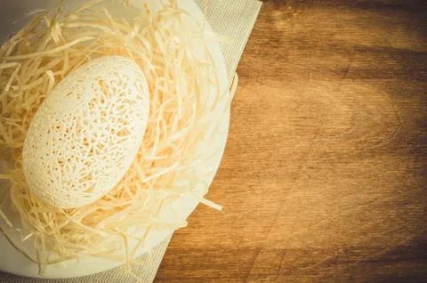 Table Setting for Easter Celebration. Carved Egg. Stock Photos