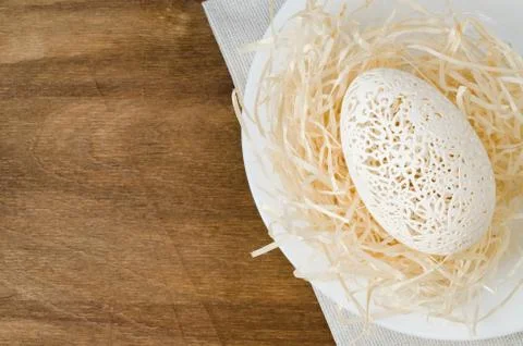 Table Setting for Easter Celebration. Carved Egg. Stock-Fotos