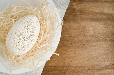 Table Setting for Easter Celebration. Carved Egg. Stock-Fotos