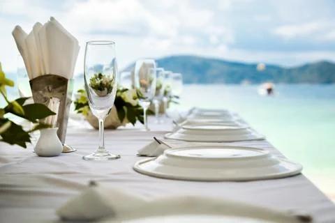 Table setting for an event party or wedding reception at the beach Stock Photos