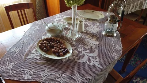 Table Setting Featuring Nuts, Ceramic Teapot, and Glass Vase Indoors Stock Footage 342019994