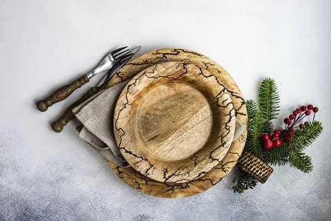 Table setting for festive holiday Christmas dinner on grey background with copy Stock Photos