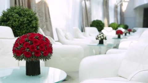 Table setting with flowers of red roses. Festive table decor. Stock Footage 166028489