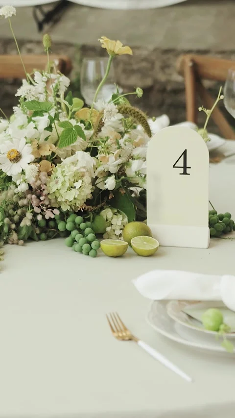 Table setting with flowers for special events and weddings. Decorated tables Stock Footage 308453180