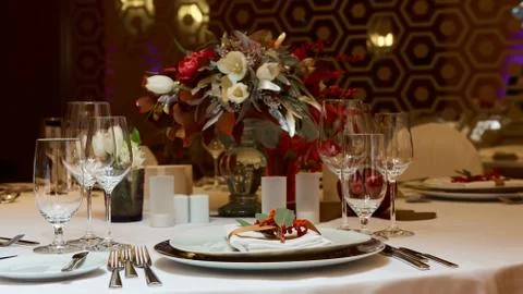 Table setting with fork, knife, plates and glass Stockfoto's