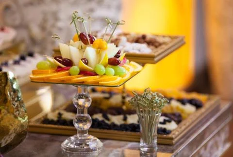 Table setting fruits at the wedding reception Stock Photos