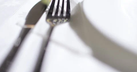 Table setting with a glass of red wine fruits cutlery Stock Footage 135526072