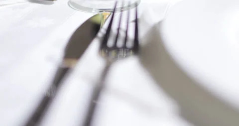 Table setting with a glass of red wine fruits cutlery Stock Footage 135526426