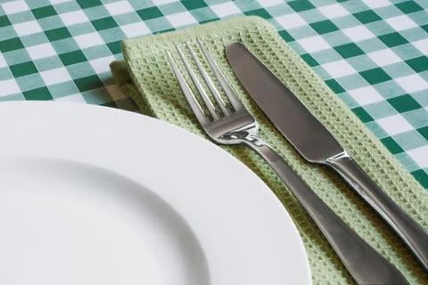 Table setting on green gingham table cloth Stock Photos