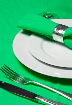 Table setting in green Stock-Fotos