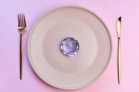 Table setting knife fork plate and jewel Stock Photos