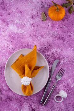 Table setting on lilac concrete background Stock Photos