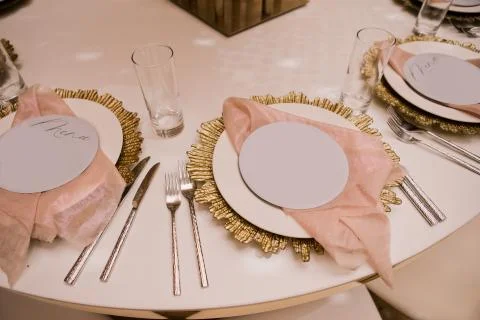 Table setting at a luxury wedding and Beautiful flowers on the table. Stock Photos