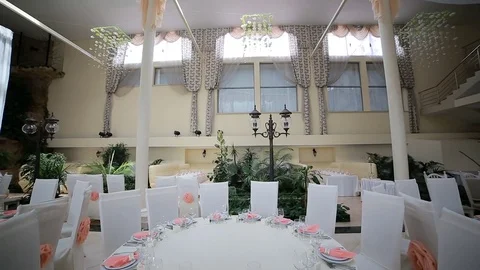 Table Setting at a Luxury Wedding Reception. Wedding reception place ready for Stock Footage 76622363