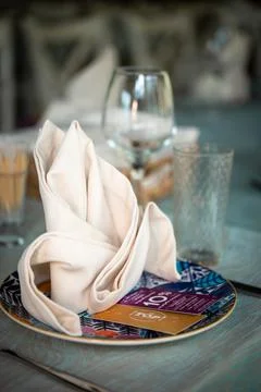 Table setting with napkins on the table close-up Stock Photos