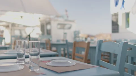 Table Setting at Outdoor Greek Taverna by the Harbor Stock Footage 290134019