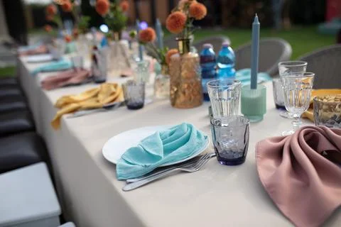 Table setting outside beautiful view glass party Stock Photos
