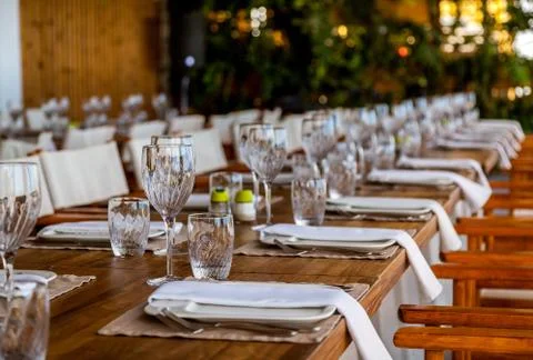 Table setting for a party or wedding reception in a restaurant. Stock Photos