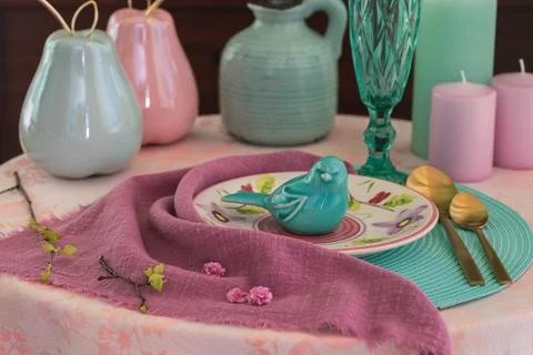 Table setting in pink and turquoise colors, spring day Stock Photos