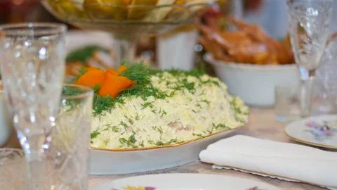 Table setting. Plates with snacks are beautifully placed on the festive home Stock Photos