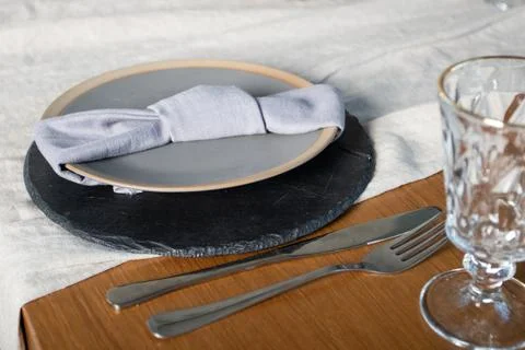 Table setting in restaurant in grey colors Stock-Fotos