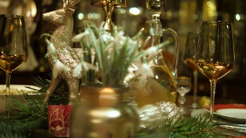 Table setting served. Plates, wine, glasses, cutlery. Christmas dinner family. Stock Footage 129044175