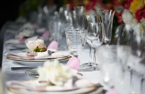 Table setting set with candles and flowers Stock Photos