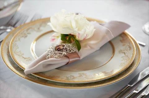Table setting set with candles and flowers Stock Photos