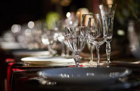 Table setting set with candles and flowers Stock Photos