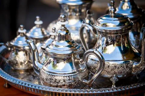 Table setting with silver tea or coffee cups Stock Photos