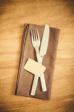 Table Setting. Silverware with Empty Tag on Linen Napkin. Stock Photos