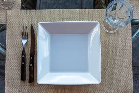 Table setting for simple lunch in restaurant Stock Photos