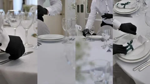 Table setting. A waiter serves a table in a restaurant. Festive table setting Stock Footage 306453312
