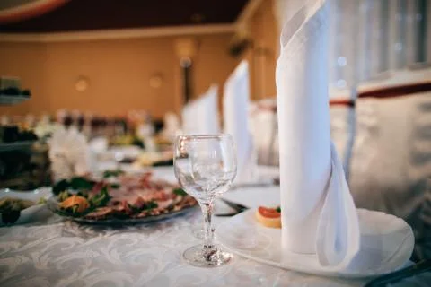 Table setting for wedding dinner in restaurant. Stock Photos