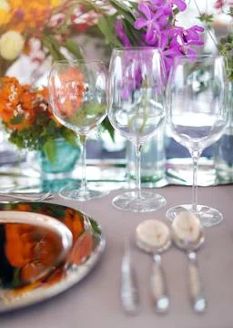 Table setting for a wedding or dinner event, with flowers Stock Photos