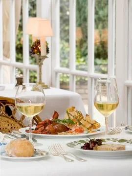 Table setting in white and yellow tones Stock Photos