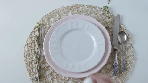 Table setting with white dishes on white background. boiled egg for breakfast Stock-Footage 108327142