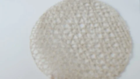 Table setting with white dishes on white background. the woman beautifully folds Stock-Footage 108328432