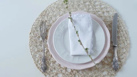 Table setting with white dishes on white background. boiled egg for breakfast Видео 108328581