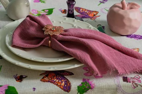 Table setting, white plates with pink napkins Stock Photos