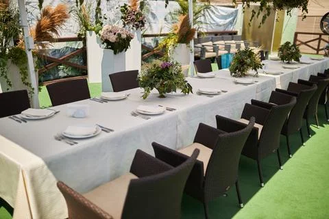 Table setting.Laid table on the terrace of the restaurant. Stock Photos