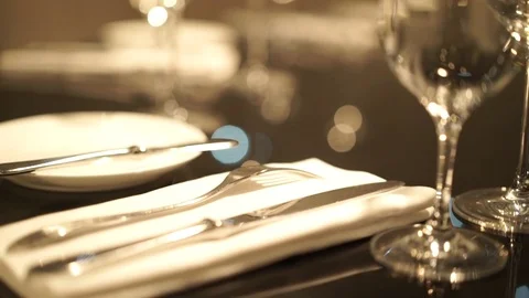 Table setting,restaurant serving,restaurant interior,empty glasses on the white Stock Footage 71494234