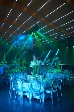 Table setup in blue light. Ready to event. Stock-Fotos