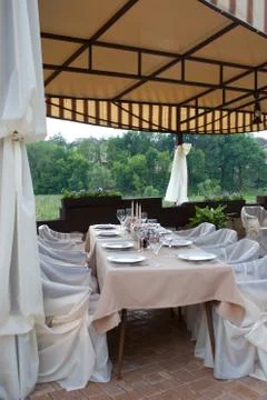 Table setup at hotel restaurant Stock Photos