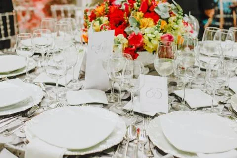 Table setup, wedding guest table, reception layout rustic and vintage backgro Stock Photos