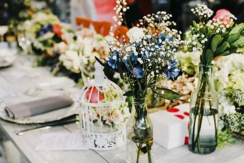 Table setup, wedding guest table, reception layout rustic and vintage backgro Stock Photos