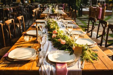 Table setup, wedding guest table, reception layout vintage and rustic Stock Photos