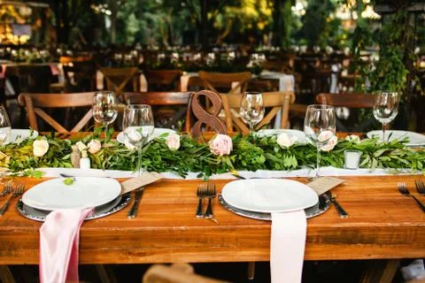 Table setup, wedding guest table, reception layout vintage and rustic Stock Photos