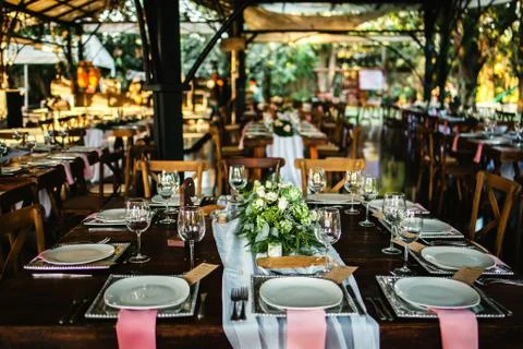 Table setup, wedding guest table, reception layout vintage and rustic Stock Photos