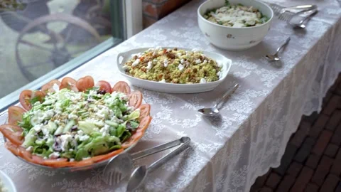Table with several salads Видео 261079399